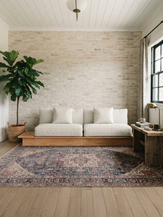 Japandi sofa with wood platform base and neutral fabric details