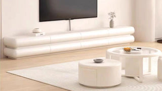 The Architecture of the Floating Horizon: Welcoming Cream Aesthetics, Sculptural Solid Wood Silhouettes, and Seamless Media Serenity into the Modern Living Room