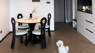 The French Mid-Century Round Dining Table: Where Compact Luxury Meets Unshakable Practicality