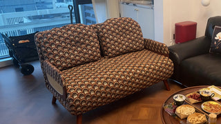 The Mid-Century Folding Sofa Bed: Timeless Warmth Meets Effortless Versatility