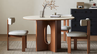 The Poetry of Circular Gatherings: Cultivating French Minimalist Sintered Stone Surfaces, Roman Travertine Plinths, and Warm Organic Textures in the Modern Dining Sanctuary