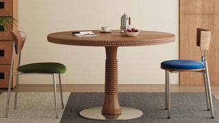The Round Dining Table: Where Mid-Century Craftsmanship Meets Timeless Elegance