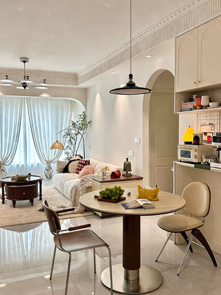 The Travertine Sintered Stone Round Dining Table: Where Bauhaus Geometry Meets Impressionist Warmth