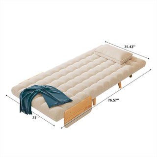 A product dimension diagram illustrates a fully flattened, wider beige linen tufted convertible armchair on a white background. A matching rectangular pillow rests neatly at the head of the bed, while a blue throw blanket is draped across the lower end. Dimension lines indicate an overall length of 76.57 inches, a bottom width of 37 inches, and a top width of 35.43 inches.