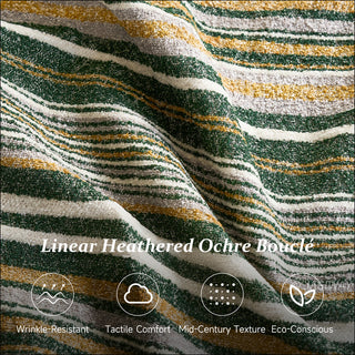 A close-up product image showcases the linear heathered ochre bouclé fabric texture with diagonal stripes in deep green, white, gray, and golden-ochre tones. Text overlay reads "Linear Heathered Ochre Bouclé," accompanied by four feature icons and labels highlighting its wrinkle-resistant nature, tactile comfort, mid-century texture, and eco-conscious design.