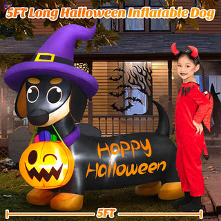 5FT long Halloween inflatable dog yard decoration featuring a cute dachshund in a witch hat holding a lighted pumpkin bucket with dimension scale for outdoor lawn displays.
