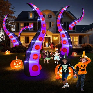 Giant Halloween inflatable purple and black monster tentacle yard decorations displayed on a festive suburban lawn at night with children in costumes and illuminated jack-o-lantern pumpkins for outdoor trick-or-treating scenes.