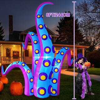 8ft / 244cm height dimension scale comparison graphic for a giant Halloween inflatable blue and purple monster tentacle yard decoration, showcasing the impressive size next to a child in a witch costume on a front lawn at night.