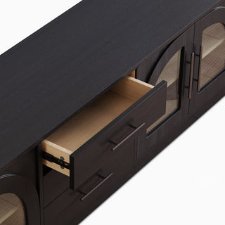JASIWAY 78-inch mid-century modern TV stand in a black wood finish, featuring four arched tempered glass doors with interior shelving and three central storage drawers, and a low-profile silhouette for contemporary living room entertainment centers.-Close-up of drawer