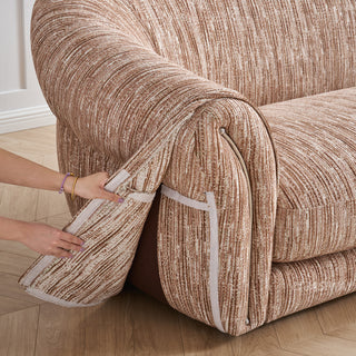 JASIWAY luxury curved chenille sofa featuring a structural biomorphic design, deep seat cushions, and premium textured multi-tonal chenille upholstery. This modern cloud couch showcases tailored rolled arms with integrated piping details and an organic, gently arched back silhouette.-Close-up of removing covers