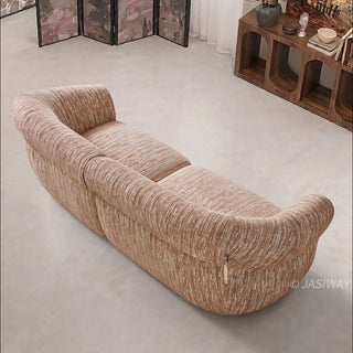 JASIWAY luxury curved chenille sofa featuring a structural biomorphic design, deep seat cushions, and premium textured multi-tonal chenille upholstery. This modern cloud couch showcases tailored rolled arms with integrated piping details and an organic, gently arched back silhouette.-High-angle rear view