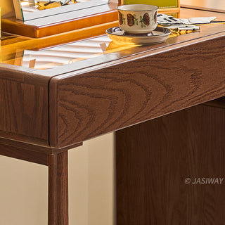 JASIWAY solid wood extendable vanity desk featuring a rich walnut-grain finish, a three-drawer side storage cabinet ,and a decorative tempered glass top, specifically engineered for luxury small-space interiors.-Close-up of edge