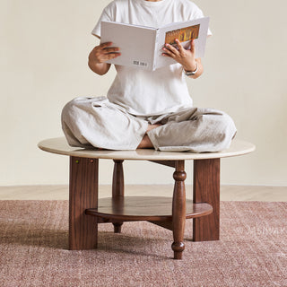 JASIWAY mid-century modern round coffee table featuring a polished beige faux marble top and a 2-tier functional design with a walnut-finished solid wood storage shelf and base.-Durability and load-bearing test