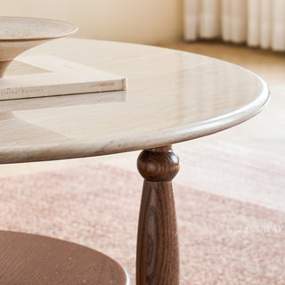 JASIWAY mid-century modern round coffee table featuring a polished beige faux marble top and a 2-tier functional design with a walnut-finished solid wood storage shelf and base.-Close-up of edge detail