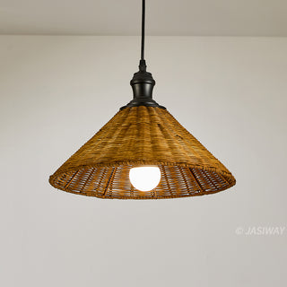 This pendant light features a conical shade crafted from natural, woven rattan, suspended from a simple black fixture and cord. A single, bright white bulb is visible within the shade, set against a plain light grey background. This design offers a rustic yet modern aesthetic suitable for various interior styles.