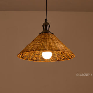 This pendant light features a conical, woven rattan shade that provides a warm, organic aesthetic. It is suspended from a simple black fixture and cord against a solid, muted background. A single, glowing white bulb is centered within the shade, casting a soft light downward.