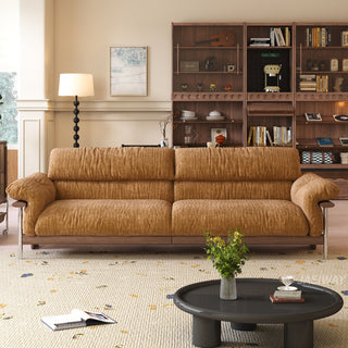 JASIWAY mid-century modern 3-seater sofa featuring textured chenille upholstery, sculptural curved armrests with integrated solid wood supports, and a low-profile exposed timber base frame accented by slender polished metal legs.-Front view