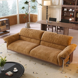 JASIWAY mid-century modern 3-seater sofa featuring textured chenille upholstery, sculptural curved armrests with integrated solid wood supports, and a low-profile exposed timber base frame accented by slender polished metal legs.-High-angle view