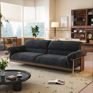 JASIWAY mid-century modern 3-seater sofa featuring textured chenille upholstery, sculptural curved armrests with integrated solid wood supports, and a low-profile exposed timber base frame accented by slender polished metal legs.-Three-quarter view