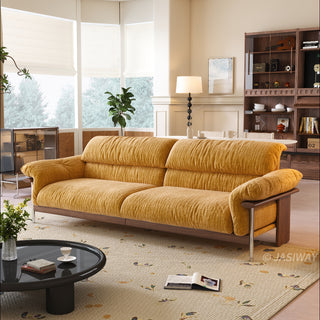 JASIWAY mid-century modern 3-seater sofa featuring textured chenille upholstery, sculptural curved armrests with integrated solid wood supports, and a low-profile exposed timber base frame accented by slender polished metal legs.-Three-quarter view