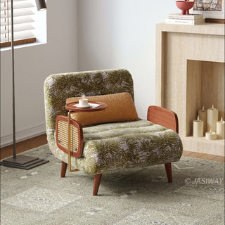JASIWAY mid-century modern convertible sleeper chair bed upholstered in premium botanical jacquard fabric with olive green palm leaf patterns. Features a space-saving multi-functional design with an integrated swivel wooden side table, woven rattan armrest details, solid wood tapered legs, and a textured mustard lumbar support pillow. Ideal luxury accent sleeper lounger for high-end apartment living and compact spaces.-Three quarter view