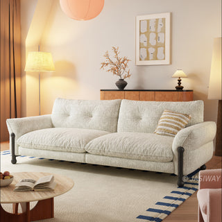 JASIWAY mid-century modern deep seat sofa featuring premium textured chenille upholstery, plush tufted back cushions, and architectural solid wood legs. This contemporary 3-seater couch combines minimalist aesthetic with a deep-set lounge profile for luxury living room seating.-Three quarter view