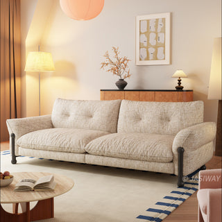 JASIWAY mid-century modern deep seat sofa featuring premium textured chenille upholstery, plush tufted back cushions, and architectural solid wood legs. This contemporary 3-seater couch combines minimalist aesthetic with a deep-set lounge profile for luxury living room seating.-Three quarter view