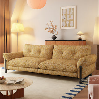JASIWAY mid-century modern deep seat sofa featuring premium textured chenille upholstery, plush tufted back cushions, and architectural solid wood legs. This contemporary 3-seater couch combines minimalist aesthetic with a deep-set lounge profile for luxury living room seating.-Three quarter view