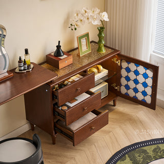 Mid-century modern solid wood makeup vanity table featuring an extendable desktop and integrated storage chest with decorative glass door, complemented by tapered legs and a space-saving telescopic configuration suitable for versatile bedroom storage.-High-angle view with drawers & door open