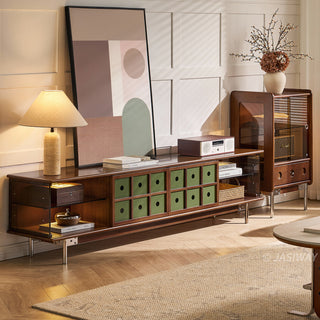 JASIWAY mid-century modern TV stand featuring a rich walnut and boxwood finish, sliding cabinet doors with olive green grid accents, and open tempered glass shelving, blending organic retro aesthetics with functional storage for upscale living room entertainment centers.-Three-quarter view