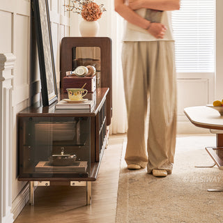 JASIWAY mid-century modern TV stand featuring a rich walnut and boxwood finish, sliding cabinet doors with olive green grid accents, and open tempered glass shelving, blending organic retro aesthetics with functional storage for upscale living room entertainment centers.-Side view
