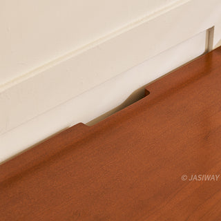 JASIWAY mid-century modern TV stand featuring a rich walnut and boxwood finish, sliding cabinet doors with olive green grid accents, and open tempered glass shelving, blending organic retro aesthetics with functional storage for upscale living room entertainment centers.-Close-up of cable management hole