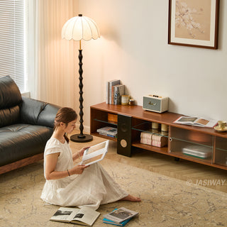 JASIWAY mid-century modern low-profile media console featuring walnut wood and boxwood finish, fluted glass sliding doors, and sleek black support legs with integrated open shelving and modular storage.-Lifestyle view