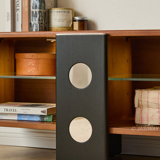 JASIWAY mid-century modern low-profile media console featuring walnut wood and boxwood finish, fluted glass sliding doors, and sleek black support legs with integrated open shelving and modular storage.-Close-up of support leg