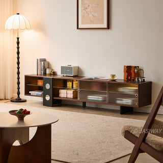 JASIWAY mid-century modern low-profile media console featuring walnut wood and boxwood finish, fluted glass sliding doors, and sleek black support legs with integrated open shelving and modular storage.-Three-quarter view