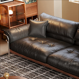 JASIWAY modern black top-grain leather sofa with adjustable headrests, luxury 3-seater couch featuring premium genuine leather upholstery, ergonomic cushioning, and sturdy wooden frame for a high-end living room aesthetic.-Close-up