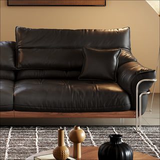 JASIWAY modern black top-grain leather sofa with adjustable headrests, luxury 3-seater couch featuring premium genuine leather upholstery, ergonomic cushioning, and sturdy wooden frame for a high-end living room aesthetic.-Close-up