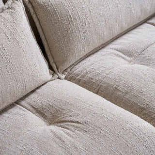 JASIWAY modern 3-seater fabric sofa with adjustable high-back headrests and deep-seated cloud cushions, featuring a low-profile minimalist design and ergonomic neck support with a high-end, contemporary aesthetic for luxury living rooms. -Close-up of cushion detail
