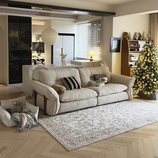 JASIWAY 3-seater fabric sofa featuring a low-profile Japandi silhouette with tufted back cushions and deep-seated upholstery, finished in a textured beige-toned linen-look bouclé fabric that emphasizes a minimalist yet sophisticated living room aesthetic.-Three-quarter view