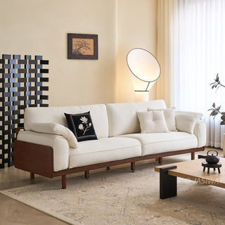 JASIWAY modern 3-seater sofa featuring a low-profile silhouette and a solid walnut-finished wood frame, upholstered in premium fabric or top grain leather, ideal for curated modern living room interiors.-Three-quarter view