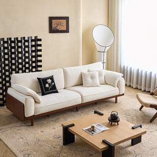 JASIWAY modern 3-seater sofa featuring a low-profile silhouette and a solid walnut-finished wood frame, upholstered in premium fabric or top grain leather, ideal for curated modern living room interiors.-Wide shot