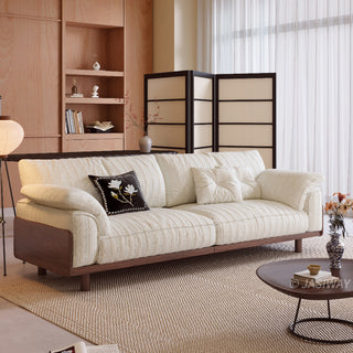 JASIWAY modern 3-seater sofa featuring a low-profile silhouette and a solid walnut-finished wood frame, upholstered in premium fabric or top grain leather, ideal for curated modern living room interiors.-Three-quarter view