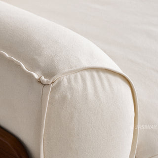 JASIWAY modern 3-seater sofa featuring a low-profile silhouette and a solid walnut-finished wood frame, upholstered in premium fabric or top grain leather, ideal for curated modern living room interiors.-Close-up of stitching detail