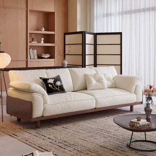 JASIWAY modern 3-seater sofa featuring a low-profile silhouette and a solid walnut-finished wood frame, upholstered in premium fabric or top grain leather, ideal for curated modern living room interiors.-Three-quarter view