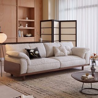 JASIWAY modern 3-seater sofa featuring a low-profile silhouette and a solid walnut-finished wood frame, upholstered in premium fabric or top grain leather, ideal for curated modern living room interiors.-Three-quarter view