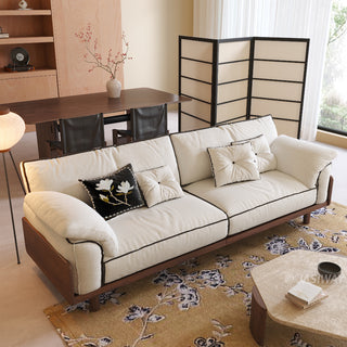 JASIWAY modern 3-seater sofa featuring a low-profile silhouette and a solid walnut-finished wood frame, upholstered in premium fabric or top grain leather, ideal for curated modern living room interiors.-High-angle view