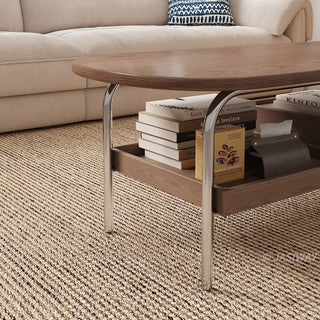 JASIWAY mid-century modern oval coffee table featuring a walnut-finish wood tabletop with smooth rounded edges, integrated lower storage shelf, and a built-in drawer for living room organization, ideal for small-space functionality.-Close-up of metal legs