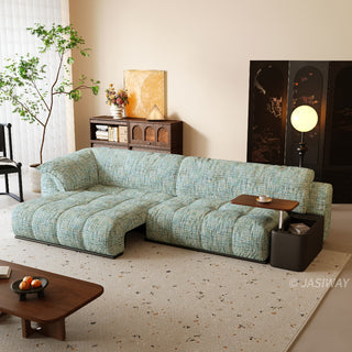 JASIWAY modern power sliding sofa featuring extra-deep electric extendable seats, and built-in side storage console with a rotating wooden tray table and USB charging ports, designed for bed-like lounging and ergonomic comfort.-Three-quarter view with recliner mode