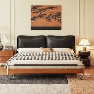 JASIWAY luxury minimalist platform bed with solid wood frame integrated with a curved chrome stainless steel tubular structure, featuring an ergonomic dual-pillow cushioned headboard upholstered in premium black leather, blending mid-century modern craftsmanship with industrial elegance, celebrated as the London Design Awards 2025 Silver Winner for master bedroom furniture design.-Front view
