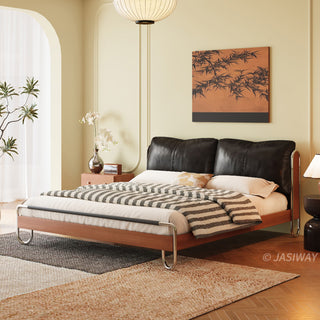 JASIWAY luxury minimalist platform bed with solid wood frame integrated with a curved chrome stainless steel tubular structure, featuring an ergonomic dual-pillow cushioned headboard upholstered in premium black leather, blending mid-century modern craftsmanship with industrial elegance, celebrated as the London Design Awards 2025 Silver Winner for master bedroom furniture design.-Three quarter view